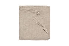 The nkuku Junto Linen Tablecloth in Natural (Small) is neatly folded and displayed against a plain white background.