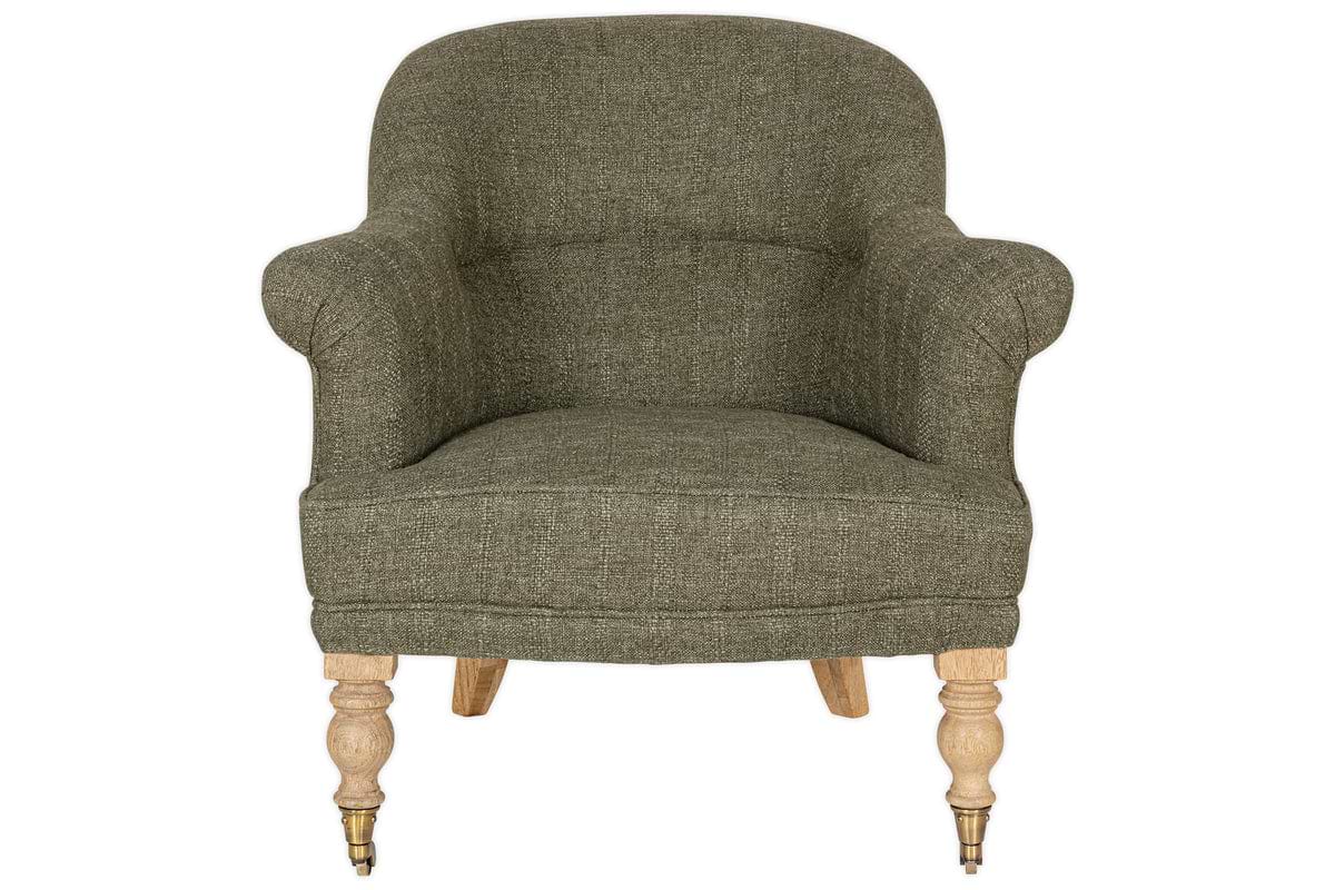 The nkuku Kiana Cotton Armchair - Moss features a green tub shape with curved arms, a rounded backrest, and hand-carved mango wood legs—two with brass casters. Upholstered in cotton for comfort, its shown against a white background.