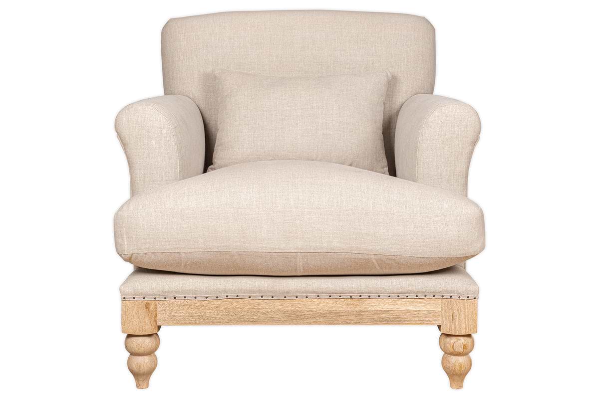 The nkuku Kashi Linen Armchair in natural beige features a solid mango wood frame with turned legs, rounded armrests, natural linen upholstery, and a matching cushion, shown from the front on a white background.
