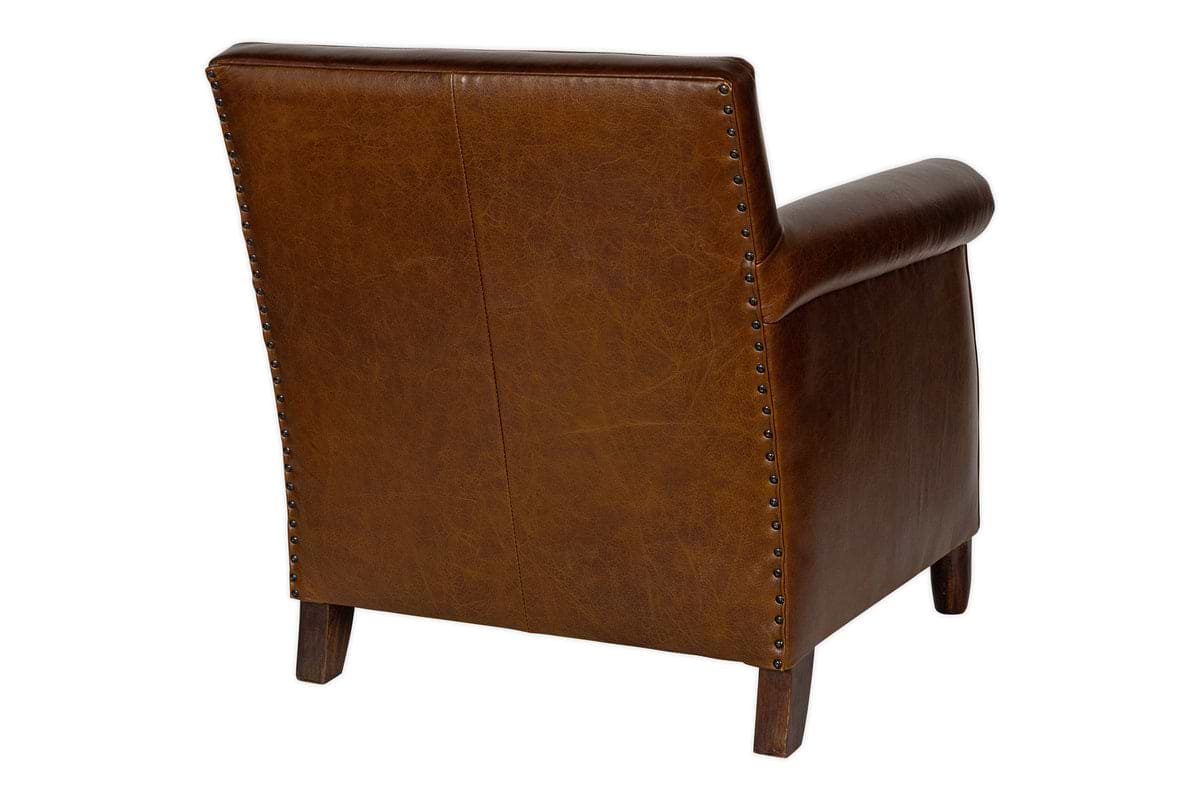 The Knada Leather Armchair by nkuku in chocolate brown buffalo leather features nailhead trim, walnut-stained feet, and a smooth, gently reclined backrest, viewed from the back and slightly to the side.