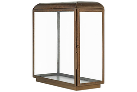 The Kiwanda Tall Lantern by nkuku features an antique brass frame and domed glass top, inspired by vintage lanterns. It has a hinged side door and is shown empty against a plain white background.