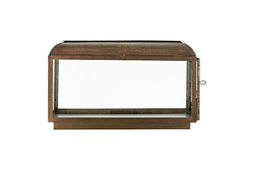 The Kiwanda Wide Lantern by nkuku features an antique brass rectangular metal and glass design with a domed top, open front, and small latch on the right side, evoking classic lantern styles. Shown against a white background.