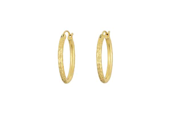 The Labani Earrings - Gold by nkuku feature a timeless hammered texture and are showcased against a white background.