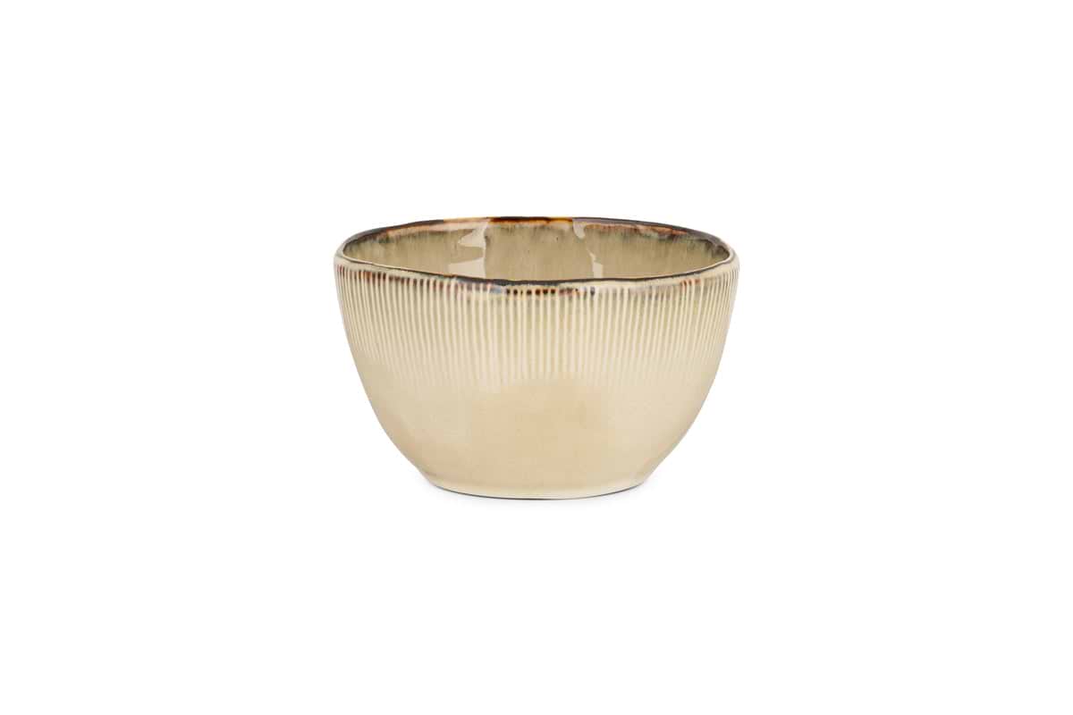The nkuku Malia Breakfast Bowl - Cream features a ribbed texture, organic shape, and slightly uneven glossy rim with reactive glaze, shown here against a white background.