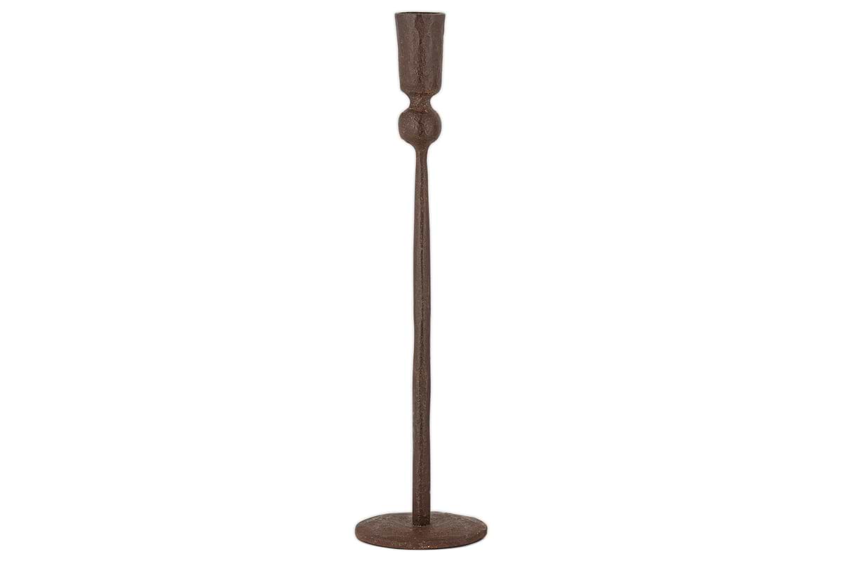 The Mawindi Candle Holder - Rust by nkuku is a tall, slender iron piece with a round base and minimalist design—ideal for adding rustic charm to earthy decor.