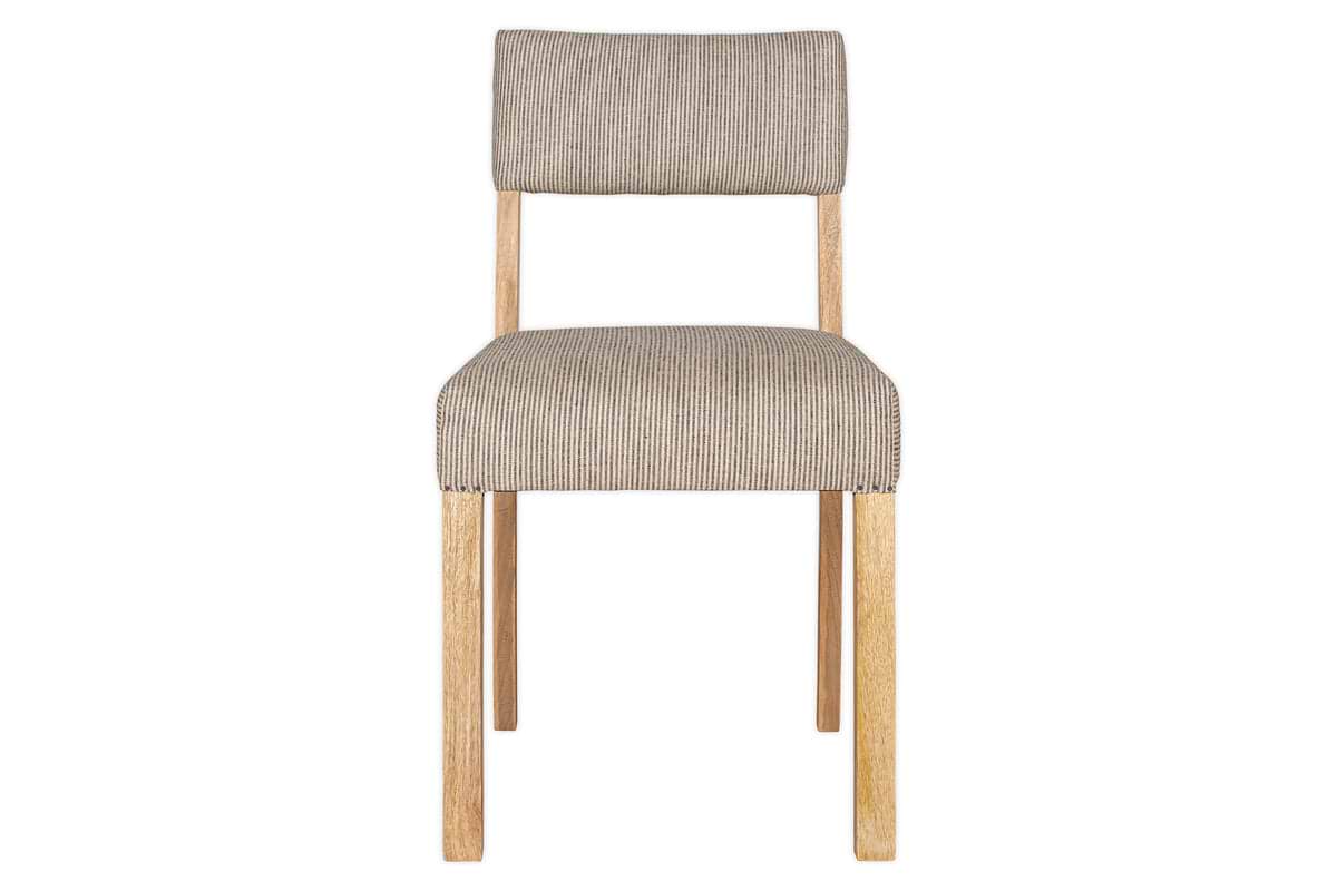 The Nadeeka Linen Upholstered Dining Chair by nkuku features a mango wood frame and soft grey linen cushioned seat and backrest, viewed from the front to highlight its simple, minimalist design.