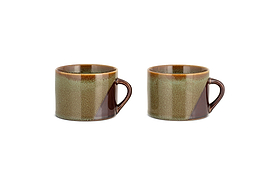 The nkuku Naav Mugs - Blue - Large (Set of 2) are placed side by side on a white background, each featuring a curved handle and glossy finish with a unique blue glaze effect.