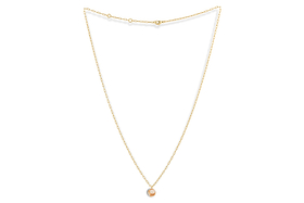 The Cerita Rhodochrosite Necklace by nkuku features a delicate gold chain and a round pink-and-white marbled rhodochrosite pendant in a simple bezel, elegantly displayed on a plain white background.
