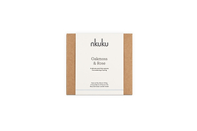 A rectangular nkuku Oakmoss & Rose 3 Wick Scented Candle - Yellow box with brown sides and a white label. This 170g candle features a spring scent, natural wax, unique essential oils, and comes in a recycled glass vessel.