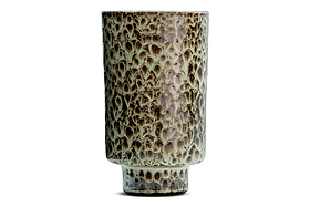 The Uzuri Vase - Brown - Tall by nkuku is a tall ceramic sculptural vase with a cylindrical form and a narrow base. Glazed in mottled earthy brown and green tones, this decorative piece features a textured, scale-like surface pattern reminiscent of animal skin or tree bark. The brown Uzuri Vase is shown against a plain white background.