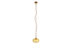 A gold chain and exposed cord suspend nkuku’s Otoro Recycled Glass Pendant - Honey - Small Round from the ceiling, showcasing its round amber glass shade with sleek brass fittings. Set against a plain white background, the pendant’s simple, modern design and eco-friendly recycled glass construction stand out.