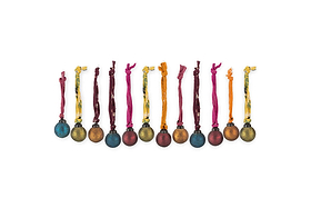 The nkuku Oko Mini Baubles - Mixed Matt (Set of 12) features metallic blue, red, gold, and brown baubles with a rustic matte finish and vibrant hanging ribbons, arranged in a charming festive row against a white background.