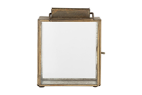 The nkuku Obi Mini Table Lantern in antique brass features a rectangular metal and glass design with a top handle, hinged glass door, and rustic finish—ideal for adding candlelight charm to any space. Shown against a white background.