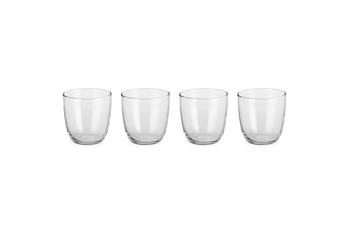 The nkuku Pani Tumbler - Clear (Set of 4) features lightweight, durable recycled glass tumblers arranged on a white background.