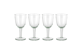 The nkuku Pani Wine Glass - Clear (Set of 4) features four durable glasses in a row on a plain white background, ideal for everyday dining.