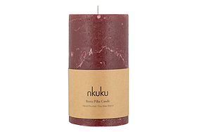 The nkuku Rustic Soy Blend Pillar Candle - Dark Cherry - Large features a beautifully textured finish and a brown paper label reading nkuku Rustic Pillar Candle Hand Poured | Soy Wax Blend.