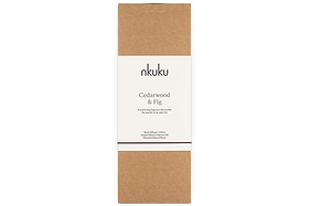 A rectangular box with a brown base and a white label featuring the nkuku brand. The label reads Cedarwood & Fig Reed Diffuser, describing the inviting cedarwood fragrance inside.