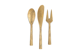 The nkuku Roda Serving Set - Antique Brass (Set of 3) includes a spoon, long knife, and two-pronged fork arranged vertically on a white background—ideal antique brass cheese and charcuterie serving utensils.