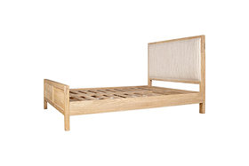 The Sanja Stripe Bed - Natural by nkuku features a solid mango wood frame, slatted base, rectangular headboard with textured panel, and matching footboard, shown against a white background.