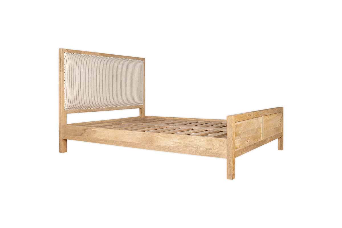 The Sanja Stripe Bed - Natural by nkuku is crafted from solid mango wood and features a stylish white cotton headboard.