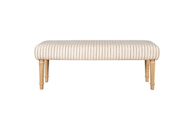 The Sanja Stripe Upholstered Bench by nkuku features a rectangular design, light wood legs, and a cushioned grey seat with thin vertical black stripes, shown against a white background.