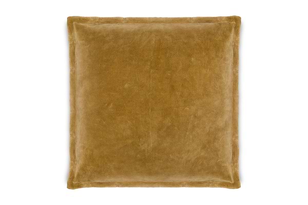 The nkuku Sela Velvet Cushion Cover in ochre features a rectangular design with a plush texture and subtly raised edge seams, shown here against a white background.