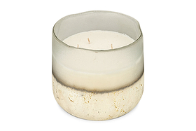 The nkuku Sea Salt & Moss 3 Wick Scented Candle comes in a round, semi-transparent glass holder with a frosted white-to-speckled gold and beige gradient and features a UK-inspired fragrance.