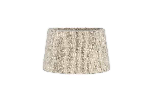 The Sakiti Bouclé Lampshade by nkuku features an off-white, cone-shaped woven fabric design with a classic tapered silhouette, ideal for ambient lighting. Displayed against a plain white background.