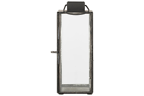 The nkuku Sia Mini Table Lantern - Black is a rectangular lantern made of antique black metal and glass, with a top handle and latched front door. Ideal for tealights, it’s shown empty against a plain white background.