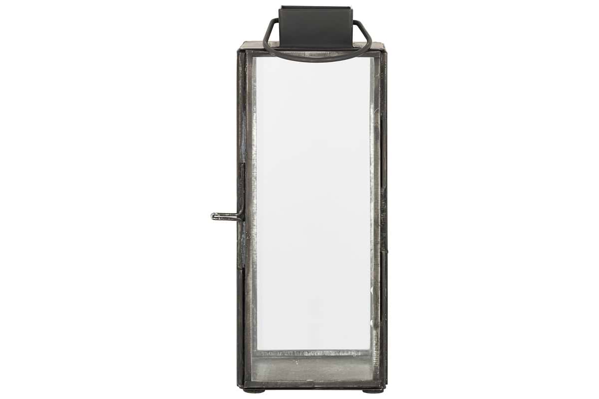 The nkuku Sia Mini Table Lantern - Black is a rectangular lantern made of antique black metal and glass, with a top handle and latched front door. Ideal for tealights, it’s shown empty against a plain white background.