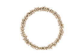 The nkuku Tanu Mango Wood Beaded Wreath in Brass & Natural features small, light-colored beads and antique brass wire in a clustered, circular design with a natural, textured look against a plain white background.