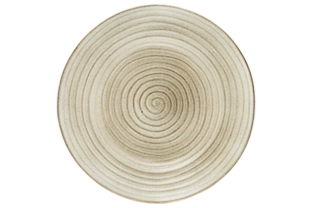 The nkuku Valinha Earthenware Round Platter in grey is an oversized ceramic platter featuring a textured concentric circle pattern and a reactive glaze.