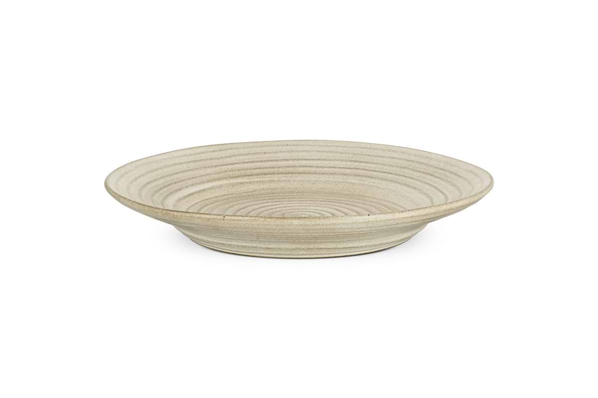The nkuku Valinha Earthenware Round Platter in grey features a reactive glaze, shallow depth, and concentric ridges, adding stylish charm to your serveware collection. Set against a white background.