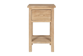 The nkuku Vivan Grooved Bedside Table in Natural features a light wood finish, single drawer, open shelf, and straight legs. Its minimalist rectangular design is ideal for modern bedrooms.