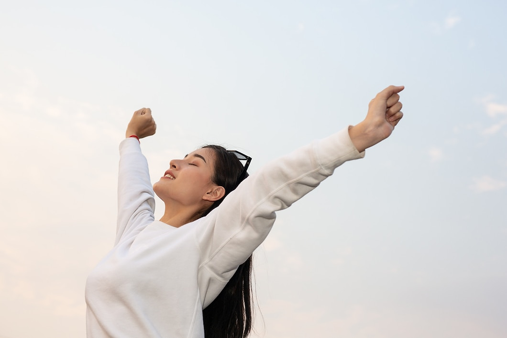 healthy woman stretching in the morning