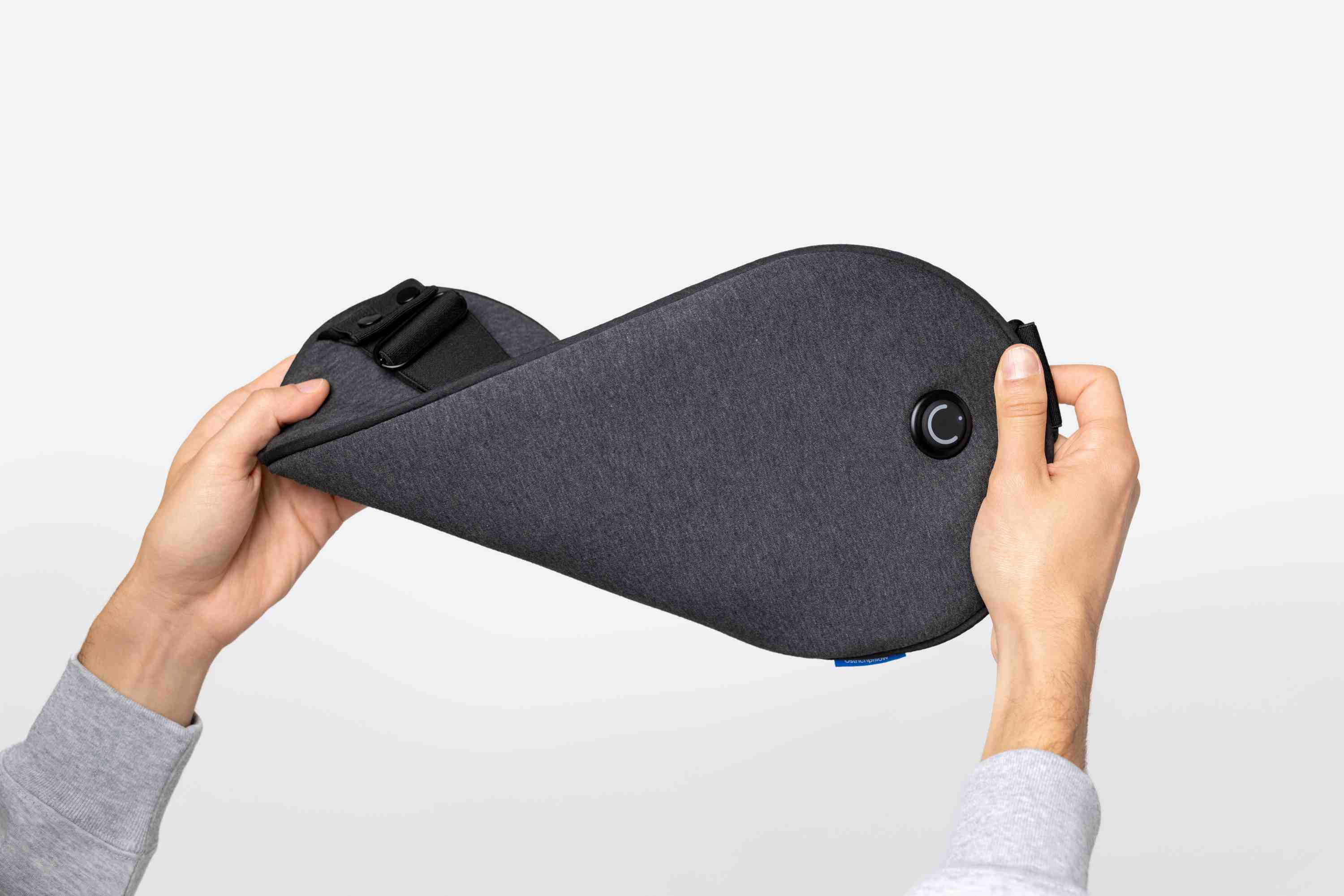 Close-up of flexible Embrace Heating Pad and its adjustable heat controls