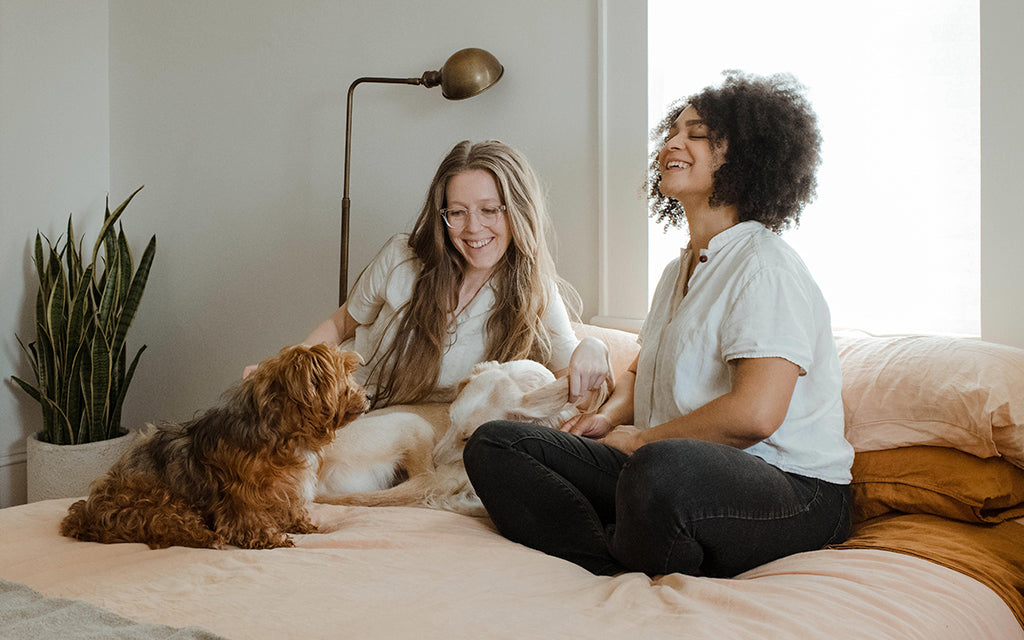 Two women and a dog