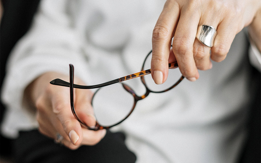 Man holding glasses