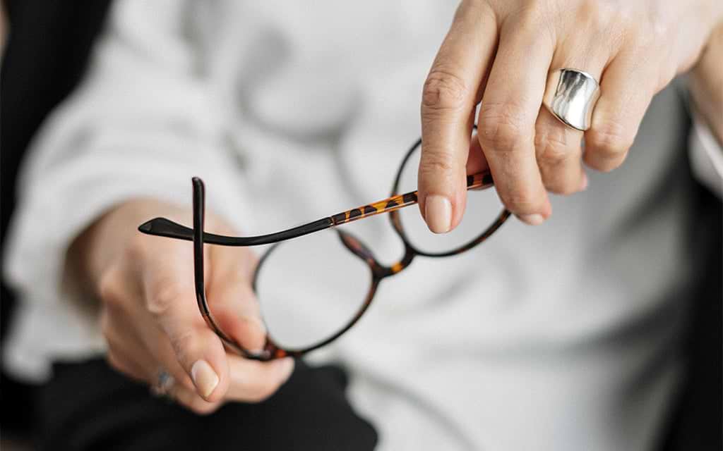 Man holding glasses