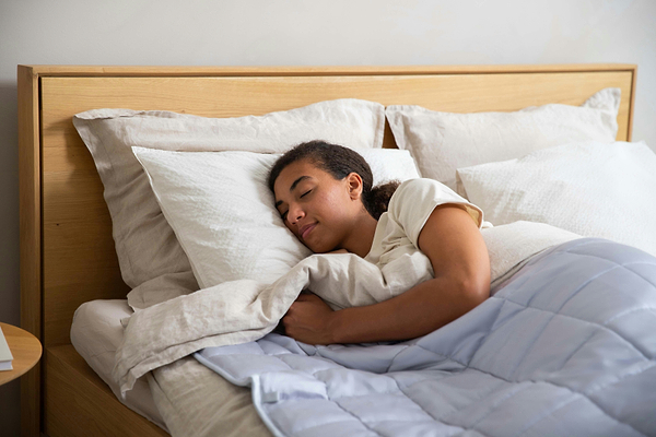 Person sleeping peacefully on their side.