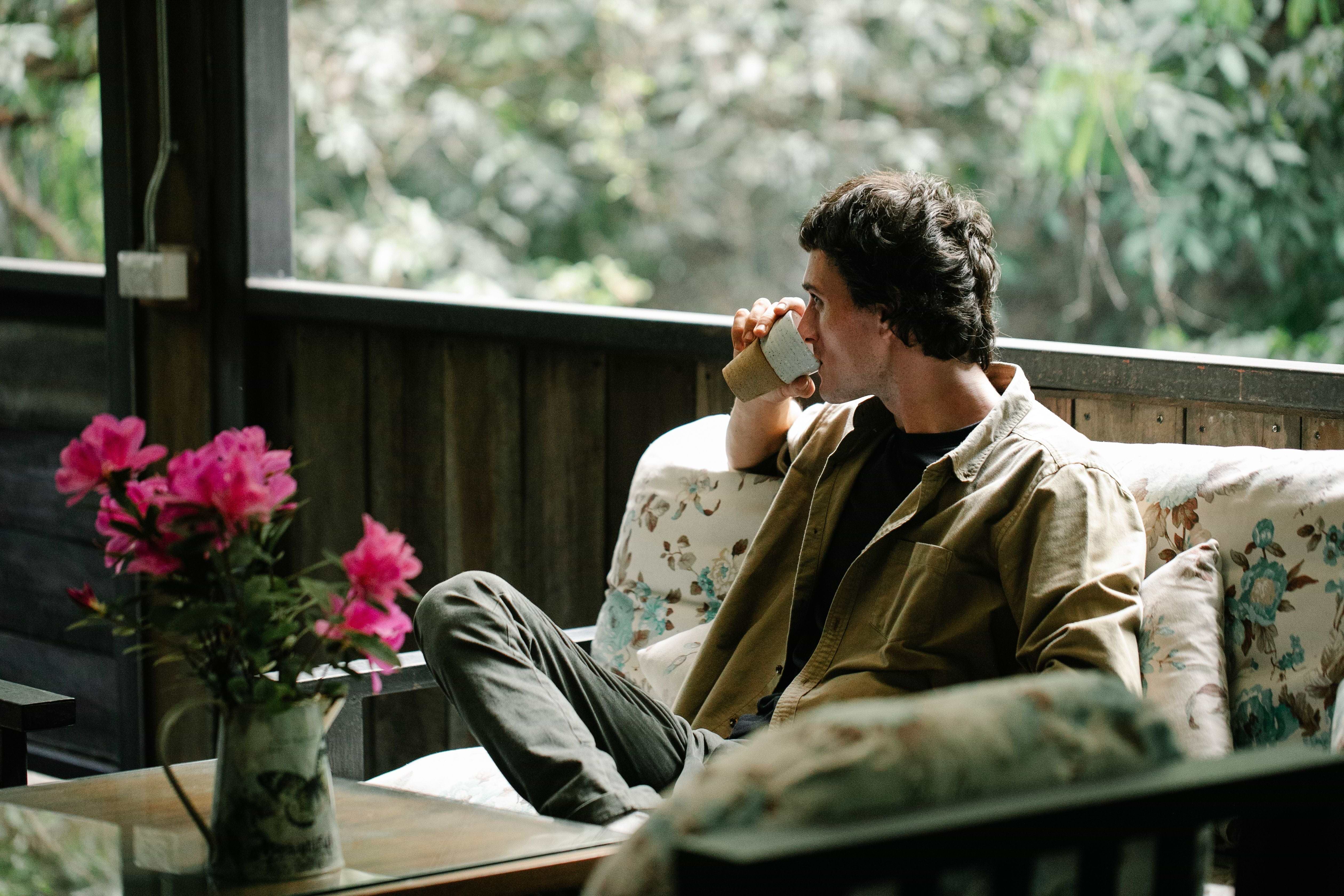 Man taking a break and drinking coffee