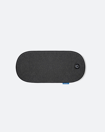 An e-commerce color variant selection card for the Embrace Heating Pad, showcasing the minimalist, textured Charcoal Gray option.