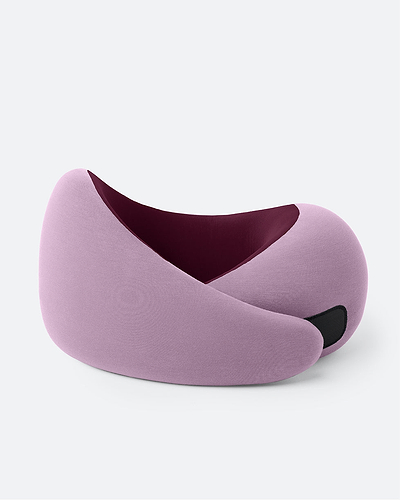 The Ostrichpillow Go Neck Pillow in the color Dusk, which has a dusty pink outer fabric and a burgundy inner lining, fastened by its adjustable strip.