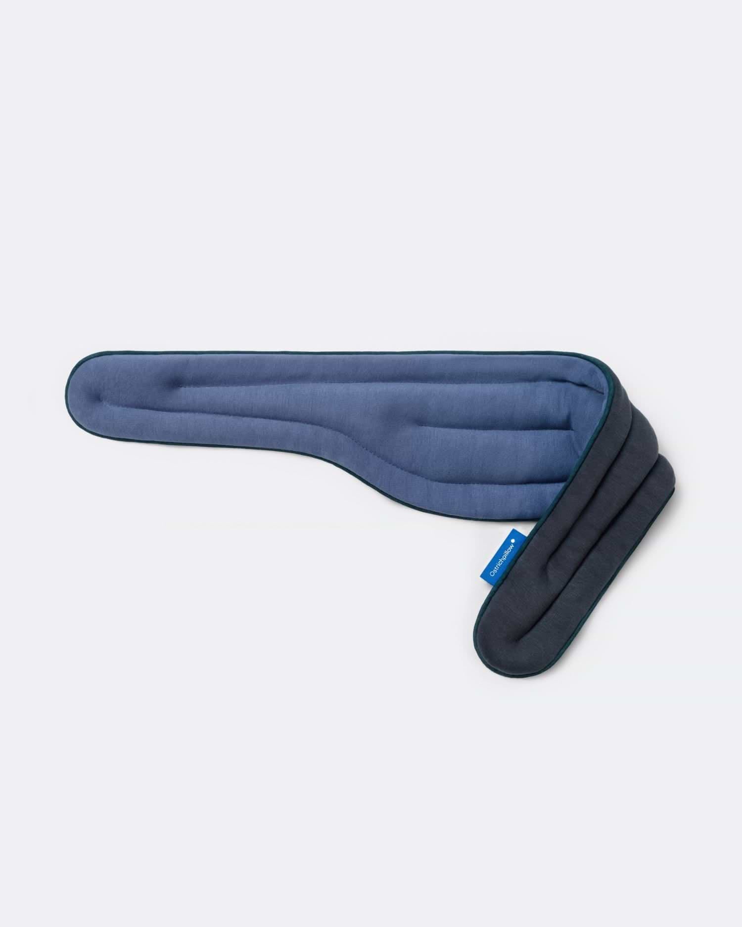 Heated Neck Wrap in 'Ocean Blue', showcasing its reversible color sides featuring a slate blue fabric on one side and a navy blue on the other.