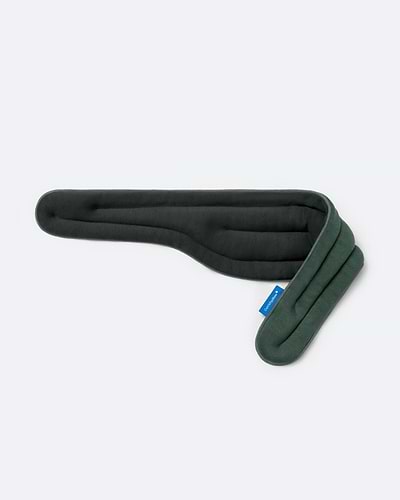 Heated Neck Wrap in 'Forest Green'. The wrap highlights its two-sided design with a dark olive fabric and a forest green fabric on the right.