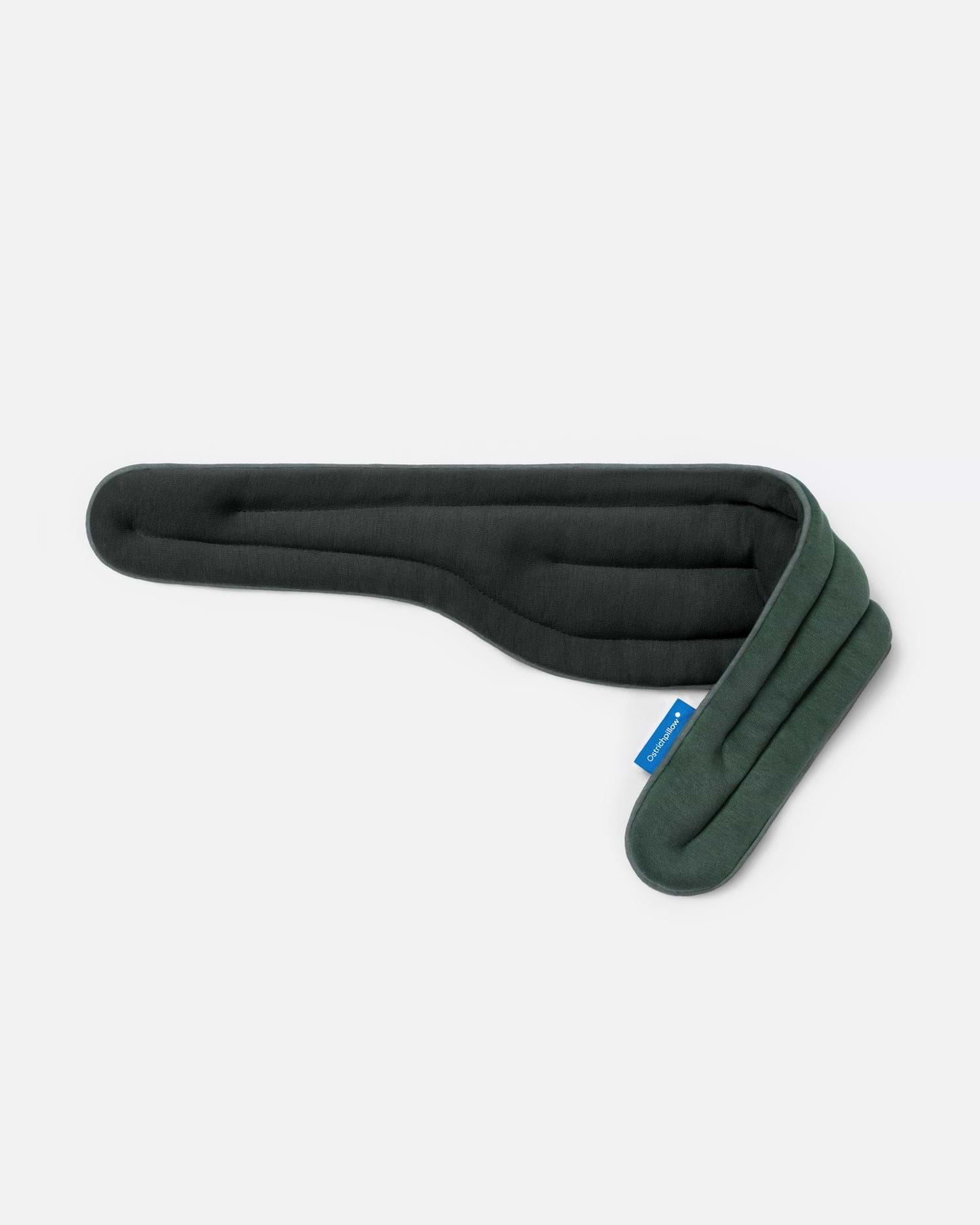 Heated Neck Wrap in 'Forest Green'. The wrap highlights its two-sided design with a dark olive fabric and a forest green fabric on the right.