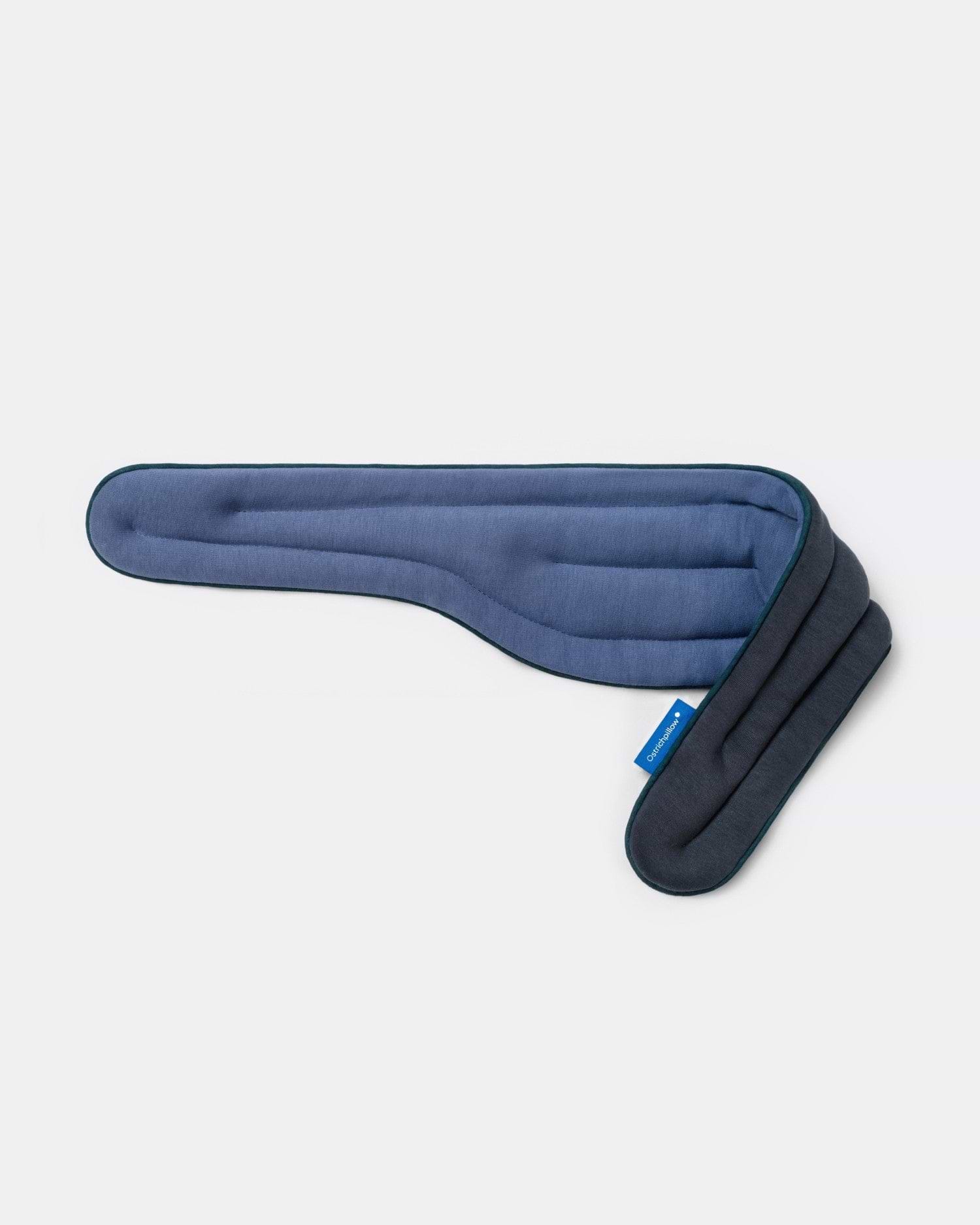 Heated Neck Wrap in 'Endless Blue'. The wrap is showcasing its reversible design with a blue fabric on one side and a teal on the other.