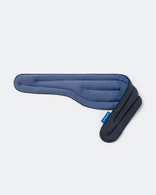 Heated Neck Wrap in 'Endless Blue'. The wrap is showcasing its reversible design with a blue fabric on one side and a teal on the other.
