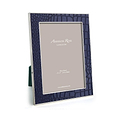 Coccodrillo blu e cornice argento