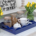 Tea cups on a navy blue lacquer tray 